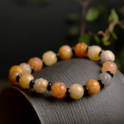 Golden Silk Jade Lotus Bead Bracelet