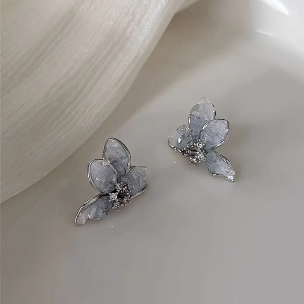 Gradient blue butterfly stud earrings