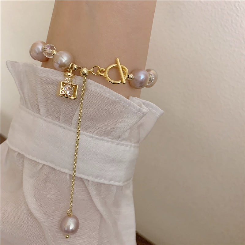 Perfume bottle pendant pearl bracelet