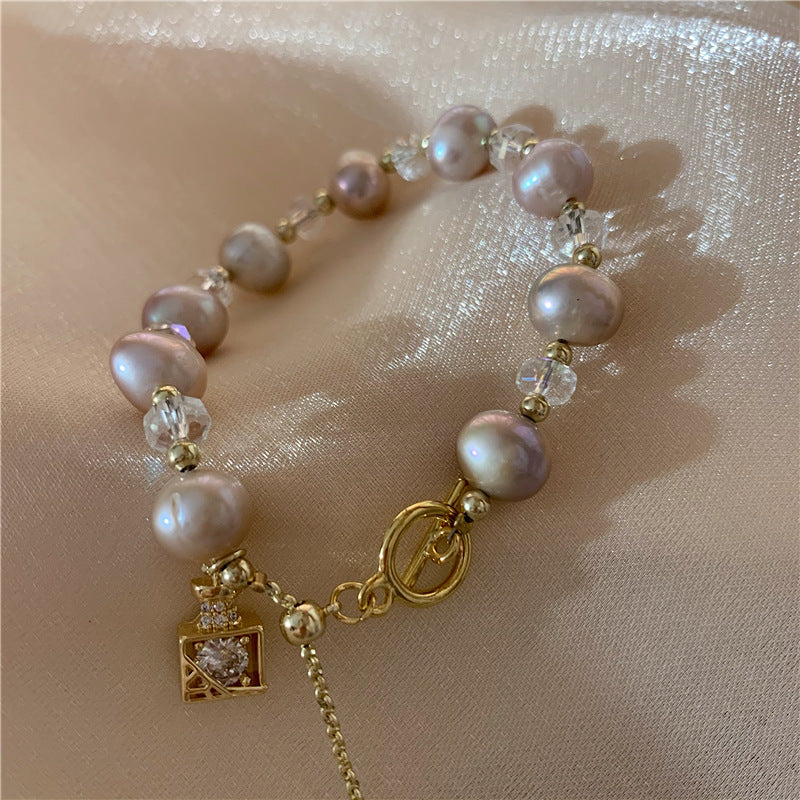 Perfume bottle pendant pearl bracelet