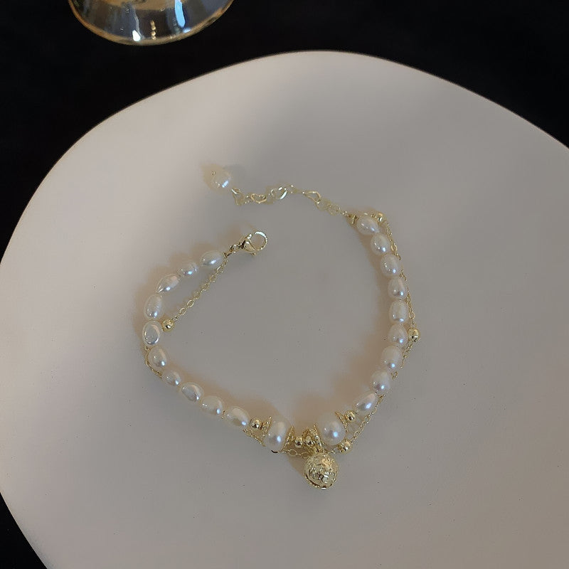 Lucky Bell • Pearl bracelet